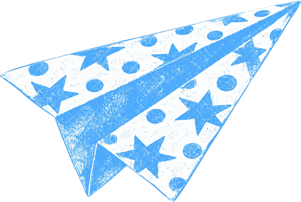 A paper aeroplane folded from star and spot wrapping paper